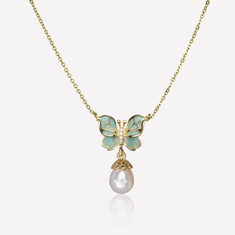 Necklace with turquoise butterfly and pearl Necklace with turquoise butterfly and pearl